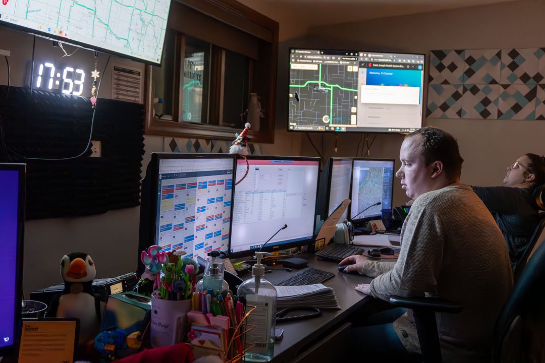 Tri-County EMS Dispatch Room with Trained Professional Working in front of computers